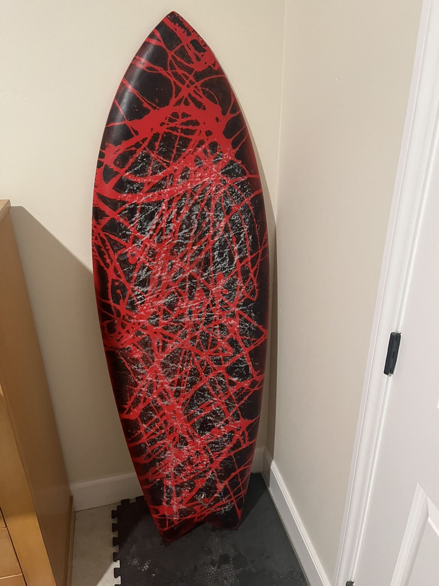 Fish surfboard glassed on fins