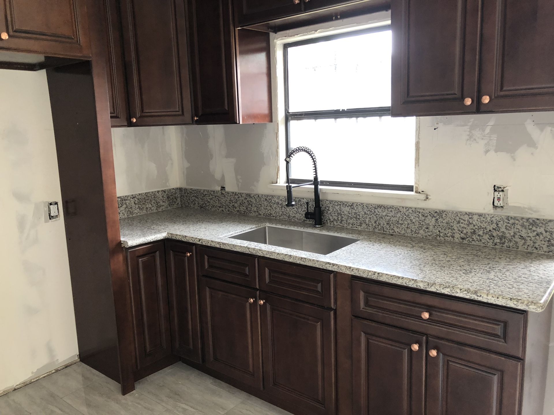 Cabinets, granite and quartz