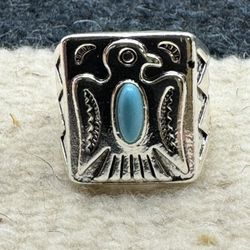 New Early American Influence Thunderbird Silver Color With Blue Inlay Setting