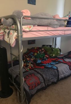 Twin bump beds ... brand new mattress plus bedding set... girl and boy.