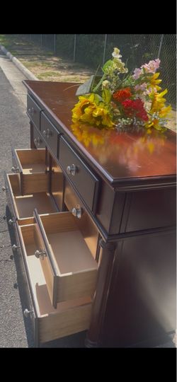 Solid wood long dresser with big drawers. Drawer sliding smoothly
