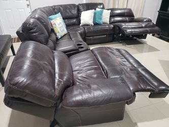 Large, dark brown leather sofa