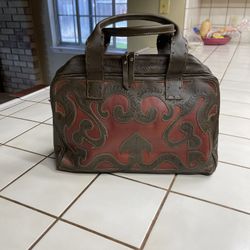 Purse Leader In Leather 