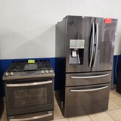 Samsung Refrigerator and G.E. Slide in Stove