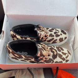 Aldo Shoes DAIGH Size 8 With Original Carry Box And Tissue Worn Once. Brown And White Spotted Cowhide With Gold Chain Links Across. 