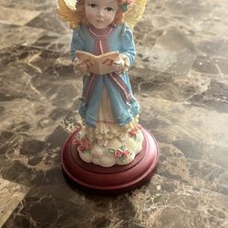 Caroling Angel Figurine