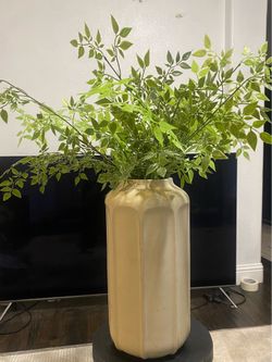 Vase with artificial plants