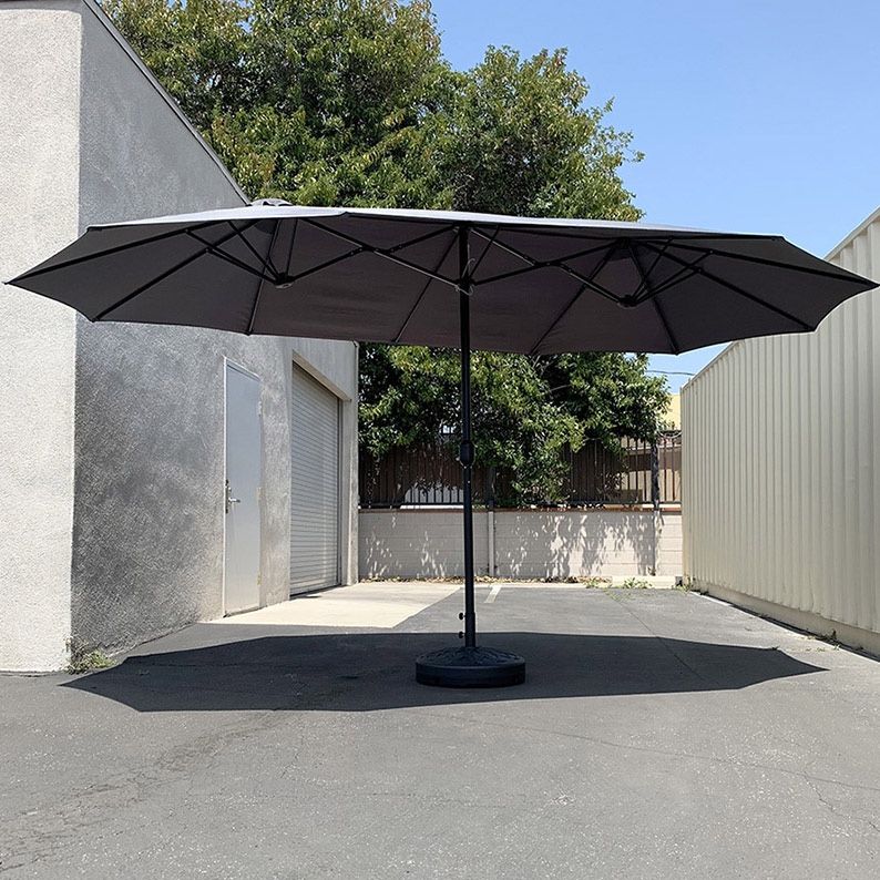 $130 (New in box) Large 15ft double sided outdoor umbrella w/ 65 lbs plastic weight base (red/gray)