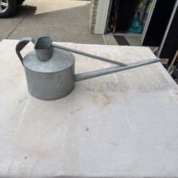 Antique watering can