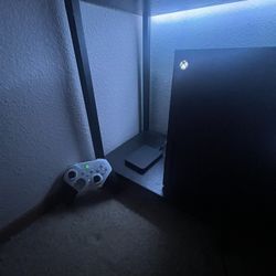 Xbox seris X, Elite controller, and 1 terabyte portable hard drive 