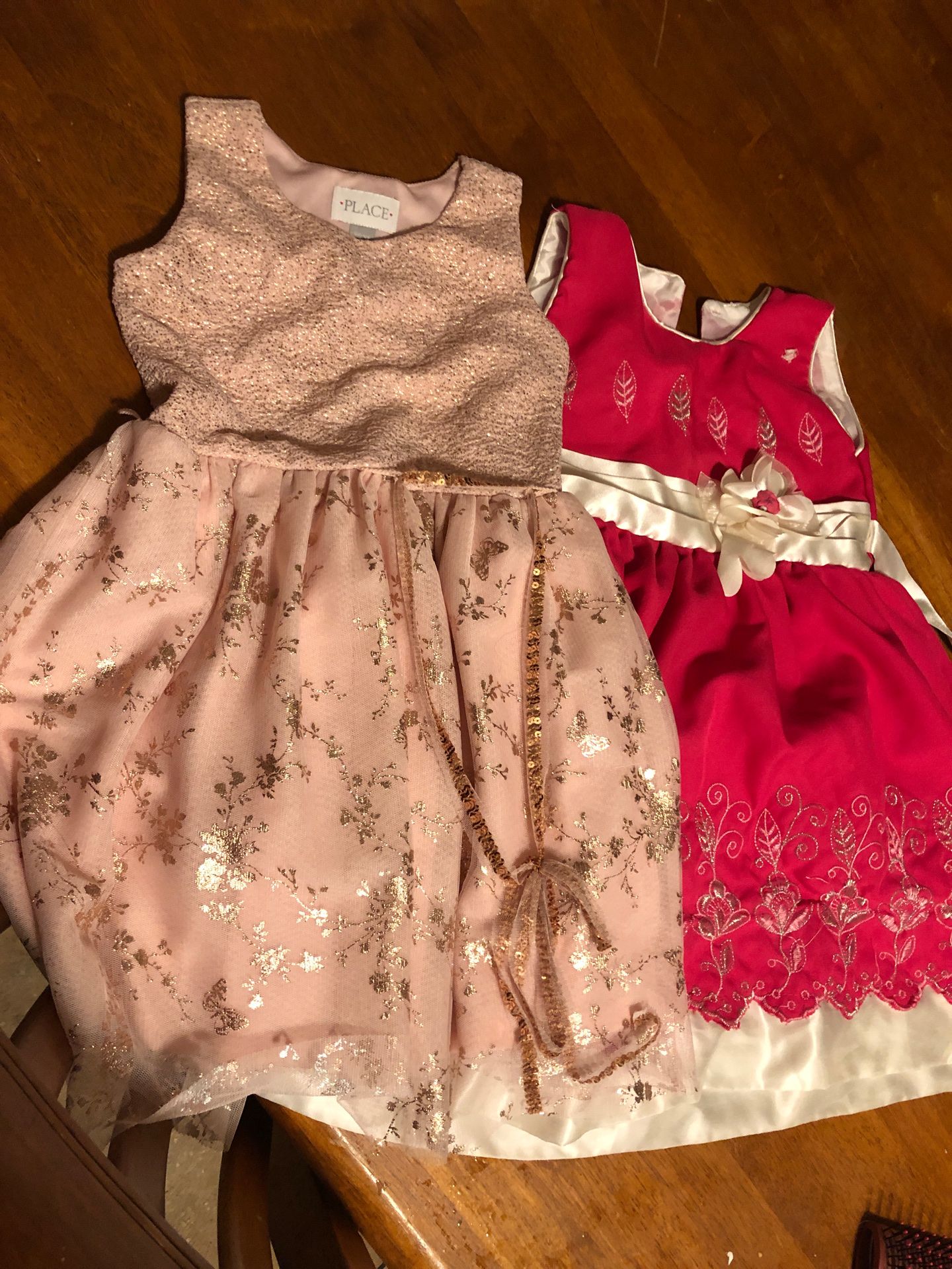 NOT FREE. Girls dresses take both for $5.00 firm