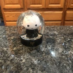 Paladone Voldemort character Harry Potter Snow Globe .  Size 3 1/2 inches Tall And 2 3/4 inches Wide .  Brand New .  Has been on display in a cabinet 