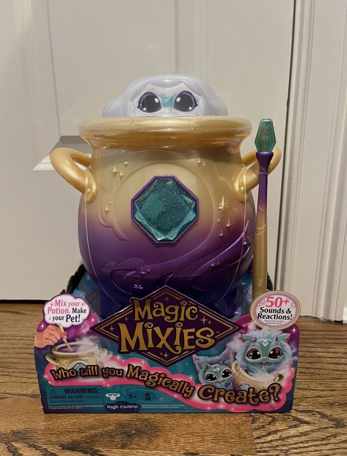 Magic Mixies Magical Misting Cauldron with Interactive 8 inch Blue Plush Toy