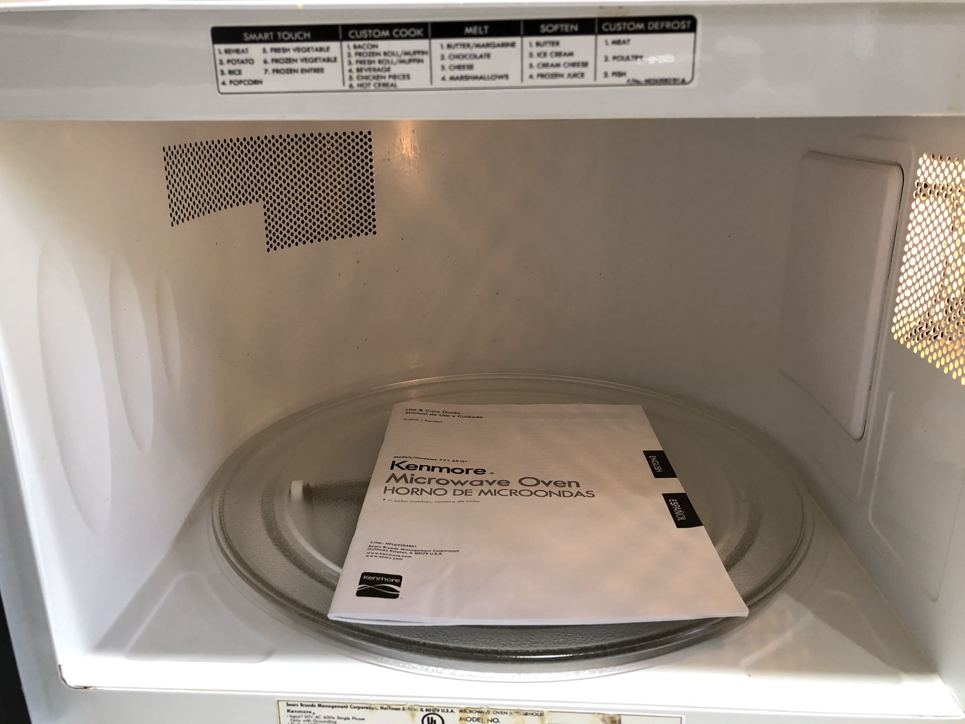 Kenmore microwave 1.2 cu ft 1200 watts, model 721.69122010 for Sale in