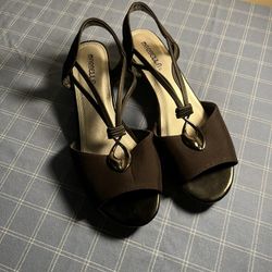 Elegant black Marella sandals with decorative straps.