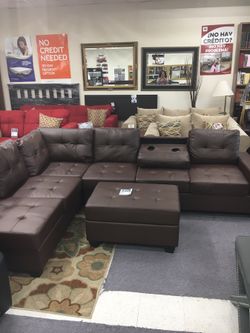 BROWN BONDED LEATHER SECTIONAL SOFA WITH OTTOMAN AND CUP HOLDERS NEW IN BOX