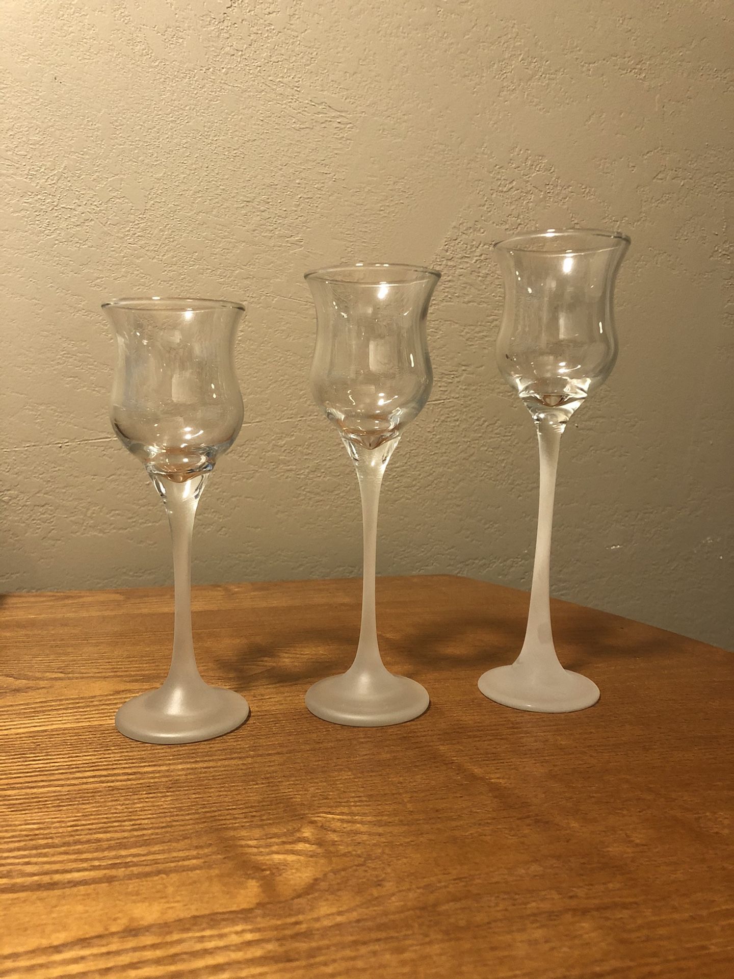 Three graduated candle holders