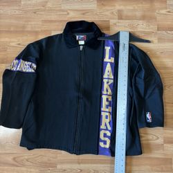 Vintage 90s Pro Player NBA Los Angeles Lakers black zip up jacket with purple vertical stripe and gold 'LAKERS' text, size L #lakers Y2K 