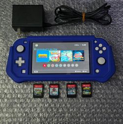 Nintendo Switch Lite and 4 games