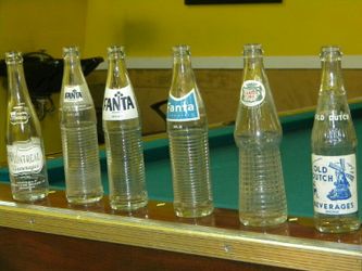 Original antique glass with different types soda bottles
