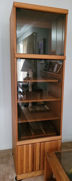 Vertical oak stereo glass cabinet