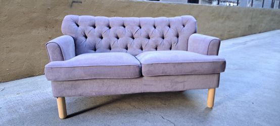 Nice Compact Tufted Upholstered Sofa.