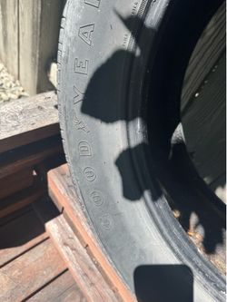 Two pair good year tire size 25560/R19
