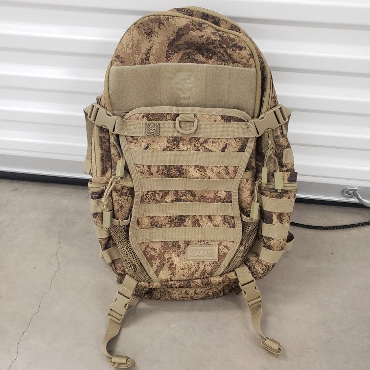 PU 16st And Broadway) ( LIKE NEW ) SOG Opord Tactical Camo Day Pack, 39.1-Liter Storage, Canyon Sand / SOG Tactical Backpack