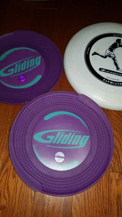 Frisbee and 2 purple glidings