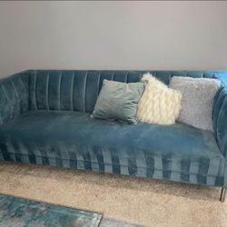 teal blue sofa