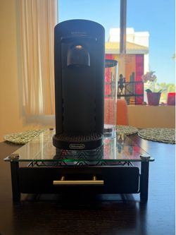Black Nespresso machine slightly used