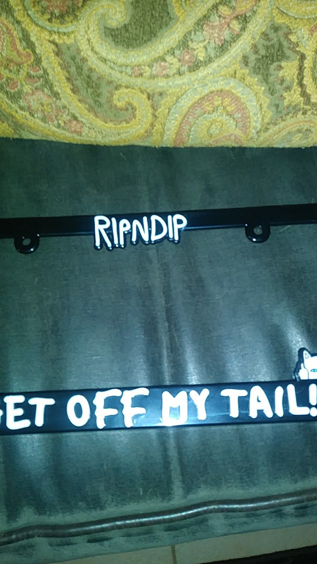 Ripndip license plate frame