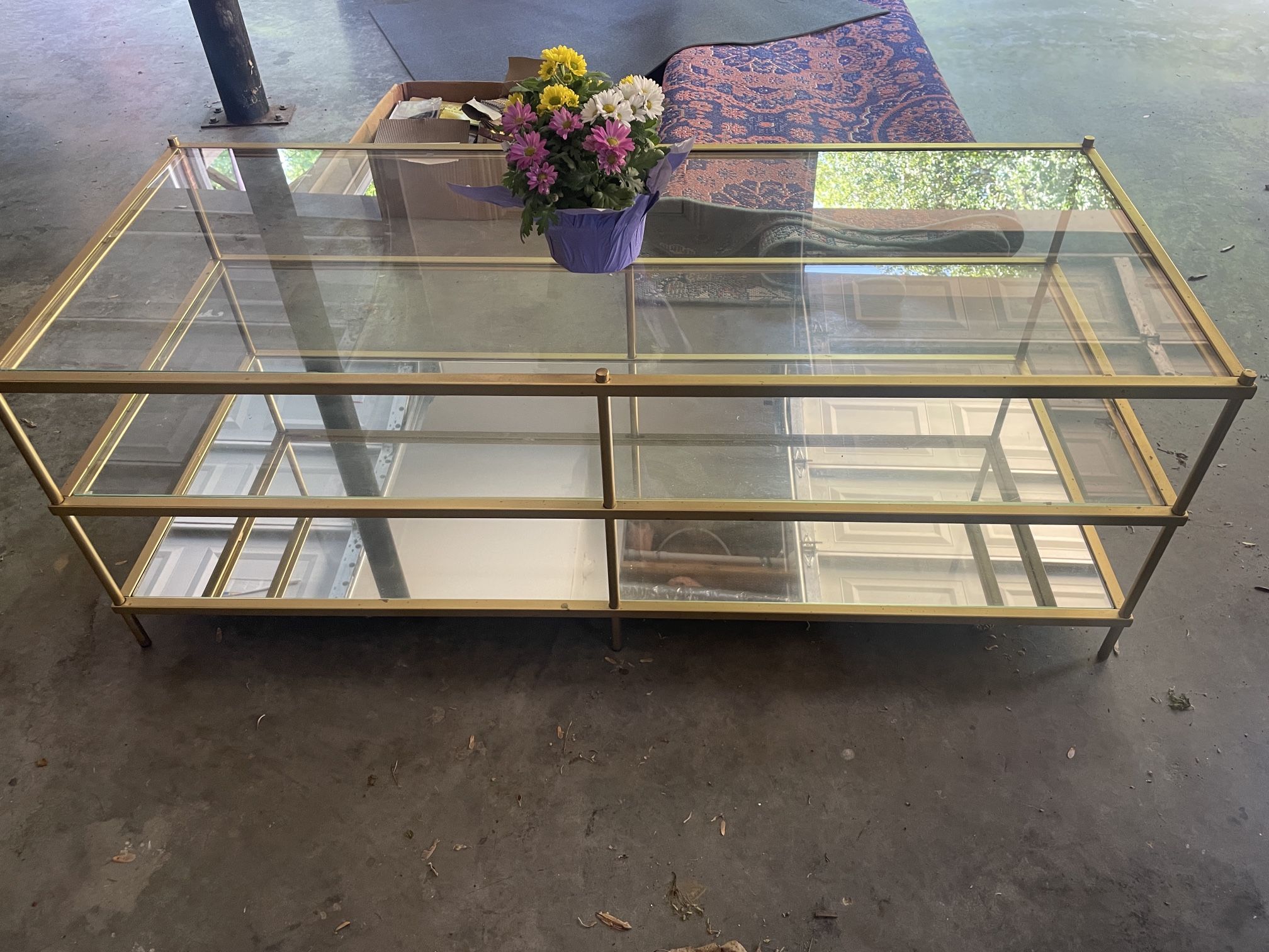 West Elm brass and glass coffee table