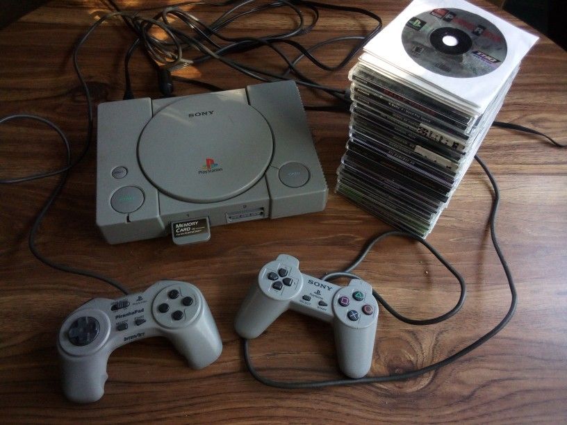 PlayStation w/ CDs