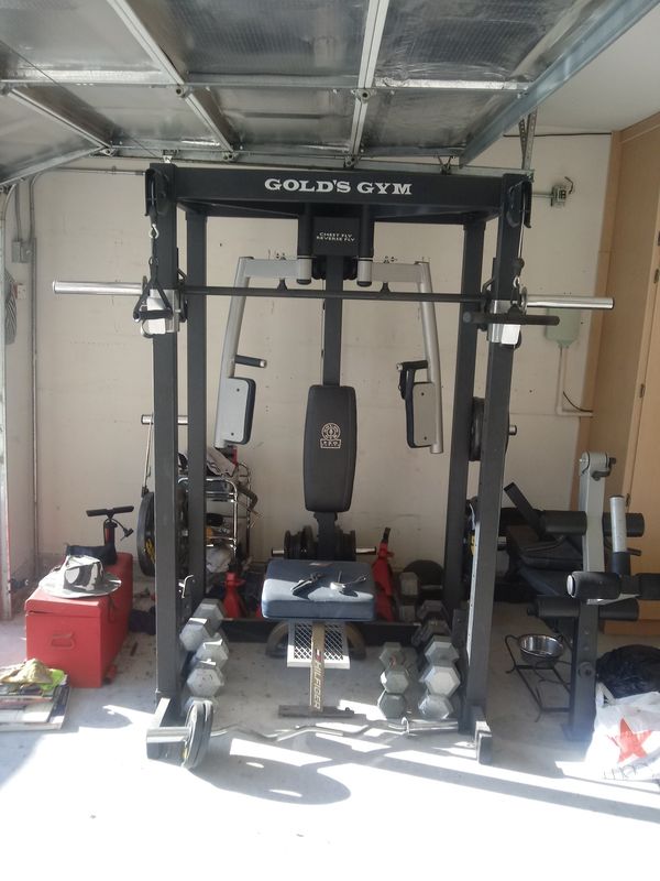 Golds gym weight set with 4/45 lbs plates 4/25/ lbs plates...bench w