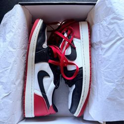 Jordan 1 low black toe