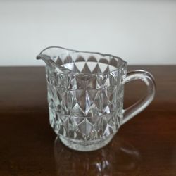 Jeannette Glass - Clear pressed glass pitcher in the 'Windsor Diamond' pattern by Jeannette Glass Company