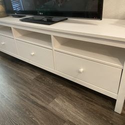 Long white table with drawers