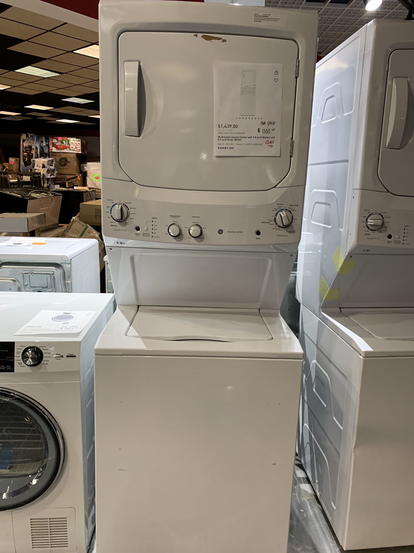 GE stacked laundry center with 3.8 cu for washer and 5.9 cu ft dryer - gas White Model# GUD27GSSMWW 1 year manufactures warranty included Retails: