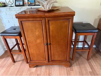 Bar Cabinet with stools and glassware