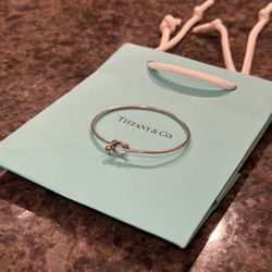 TIFFANY & CO. Vintage Love Knot Hook Bangle in 18k Yellow Gold and Sterling Silver