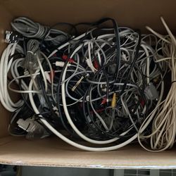 Box of vintage electronic cords and cables been in storage for at least 10 years. Some of the chords may be up to 26 years old older devices various e