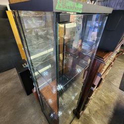 Two All glass curio with 4 shelves each $85 ea.
16.5"w x 14.5"d x 64.25"h