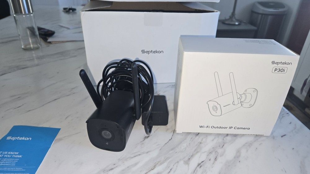 The Septekon Camera WiFi Outdoor IP Camera is a pack of 4 white wireless cameras designed for outdoor use. These cameras, model 2K Detection cam,