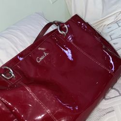 burgundy coach bag