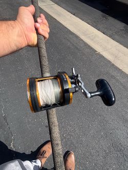 Daiwa Seagate 40H w/ 8’ Sabre deckhand rod