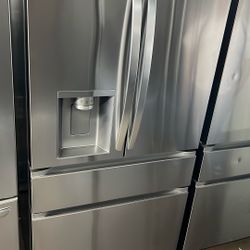 NEW OPEN BOX LG FOUR DOOR STAINLESS STEEL REFRIGERATOR 