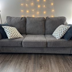  Ashley Furniture Dark Grey Couch - 82” X 40” 