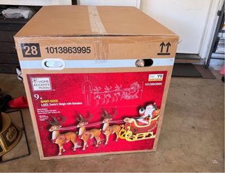 Home Accents Holiday 9ft LED Santa's Sleigh with Reindeer