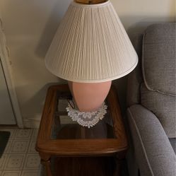 Two end tables 2 lamps also a cocktail table 